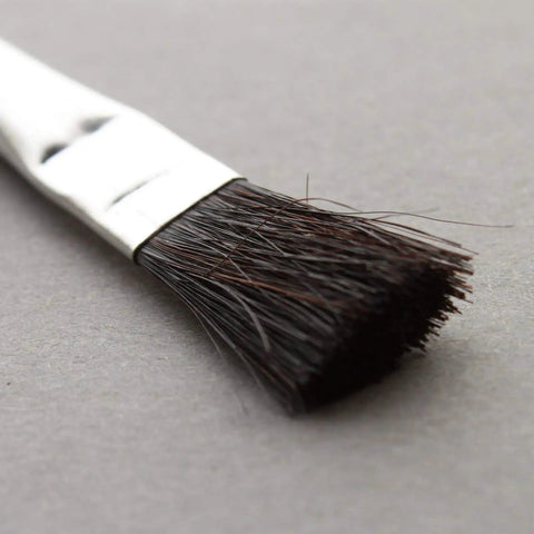 Close-up of Acid Resistant Glue Brush Set 6 Inch Metal Handle 12 Piece Heavy Duty Hard Bristle Brushes for applying glues.