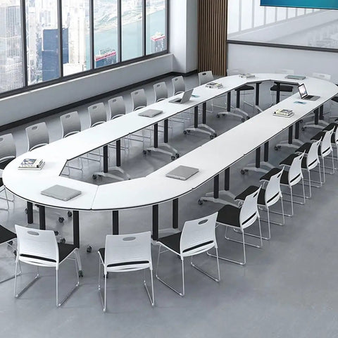 Compact Folding Computer Desk With Handy Built In Drawers And Smooth Riding Casters For Home Offices Training Rooms Or Large Conference Areas Stress Free Setup in a modern training room layout.