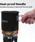 Hand holding the Fixed Star 1 Backpacking Stove System With Propane Cooking Gear showing heat-proof handle and black pot.