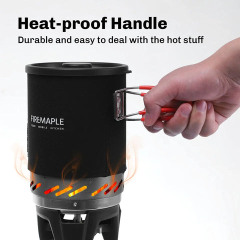 Hand holding the Fixed Star 1 Backpacking Stove System With Propane Cooking Gear showing heat-proof handle and black pot.