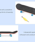 Mini Finger Skateboard With Maple Wood Deck, Deep Concave And High Kick shown with screwdriver for assembly