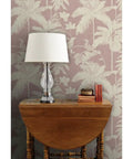 Kicked Up Your Walls With This Dope Tropical Exotic Vinyl Wallpaper Featuring A Solid Leather Texture And Heavy Duty Commercial Grade Durability Custom Printed Just For You, showcasing a stylish lamp and wooden table.