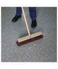 Top Shelf Floor Brush Head Replacement Featuring A Solid Hardwood Base And 18 Inch Wide Natural Palmyra Fiber Bristles for cleaning debris on a floor.