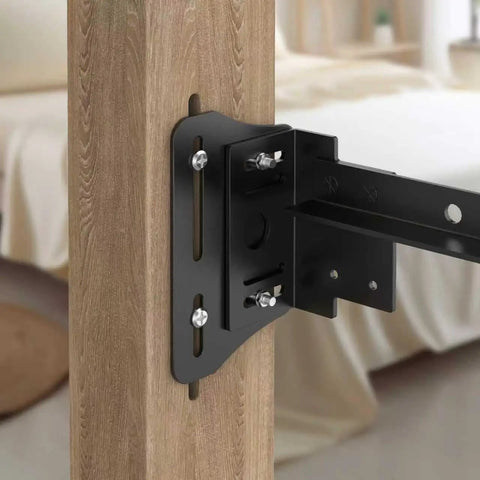 Rugged Bed Frame Connector Plates 2 Pack Universal Headboard Adapter Bracket Offset Mounting Hardware For Queen King Twin Size Adjustments and Dead Simple Swaps close-up of black steel bracket mounted on wood bed post.