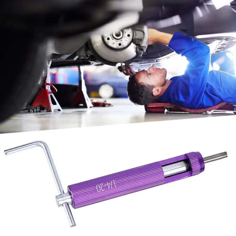 Mechanic under car using Thread Repair Insert Kit 4 20 UNC System 12 Pack Wire Screw Sleeve for thread repair