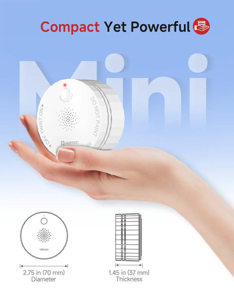 Hand holding the Interconnected Photoelectric Smoke Alarm System Battery Operated UL 217 10th Certified Wireless Interlinked Home Safety