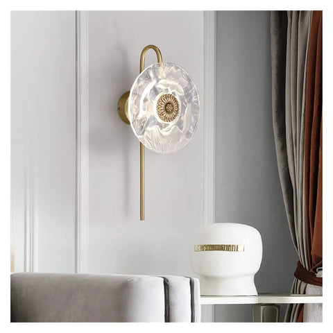Sleek Copper Wall Sconces Featuring Glare Free Led Illumination Ideal For Bedroom Nightstands And Hallways Delivering Smooth Home Decor Upgrades With Fresh Vibes mounted on a wall with a clear glass shade.