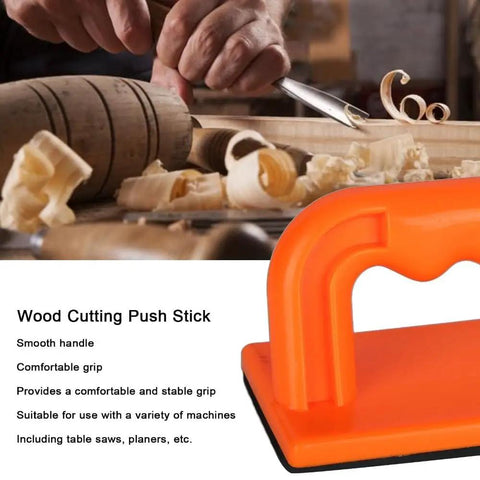 Safety Orange Oblique Push Block For Table Saws And Router Tables Featuring Steady Grip and Non Slip Base on workbench with wood.