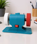 Sick Mini Bench Grinder Hitting 6000 Rpm With Dual 36 And 60 Grit Wheels shown at an angle, featuring red and white wheels for polishing.