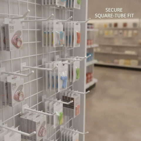 White Square Profile Metal Hook For Grid Shelving displaying packaged items in a retail setting, lightweight display hanger