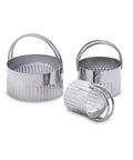 3-piece graduated stainless steel round cookie cutter set with handles for crinkle cookies and fondant.