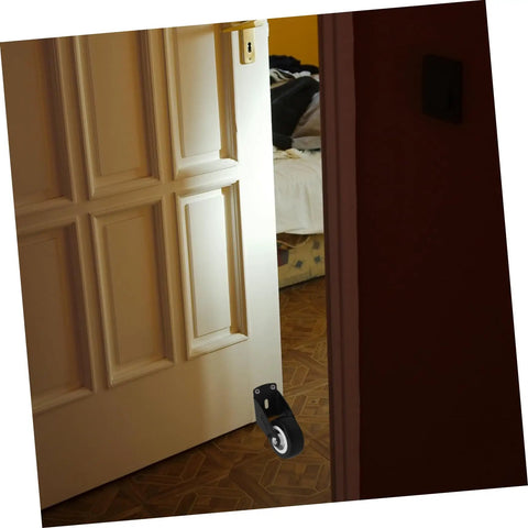 Heavy Duty Sliding Door Track Roller Wheels Four Pack Glides Smooth With Zero Drag Barn Door Hardware mounted on a door.