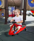 Child riding Wiggle Car Ride On Toy For Ages 3 And Up No Batteries Gears Or Pedals Just Twist Wiggle And Go Red Kid Friendly Toy