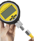 Hand holding Heavy Duty Hydraulic Pressure Gauge Digital Display 10000 PSI 700 BAR With 1/4 Inch NPT Connector