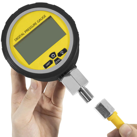 Hand holding Heavy Duty Hydraulic Pressure Gauge Digital Display 10000 PSI 700 BAR With 1/4 Inch NPT Connector