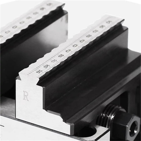Close-up of the self centering jaws on the Self Centering Concentric Vise Featuring A Six Axis Rotary Turntable Fixture for Tight Machining Jobs.