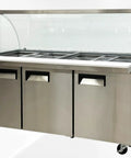 Commercial Buffet Cold Table Refrigerator Delivers Prime Cooling And Slick Stainless Steel Exterior 72 Inch Wide with glass top and three compartments.