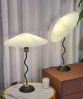Harp Folding Lamp Set Two Pieces, Modern Umbrella Pleated Desk Lamp With White Shade, Beige PVC, Iron Base on table and dresser