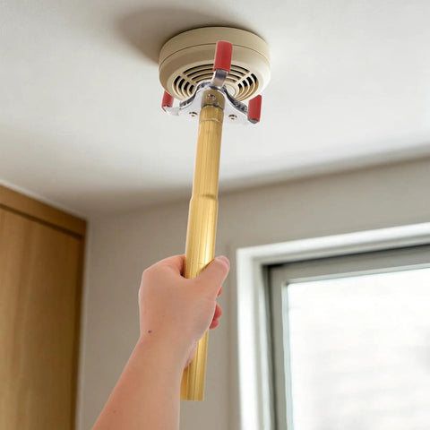Ladder Free Smoke Transducer Assembly Tool With Heavy Hitter Sensor Head For High Ceiling Detectors grips securely to a smoke detector.