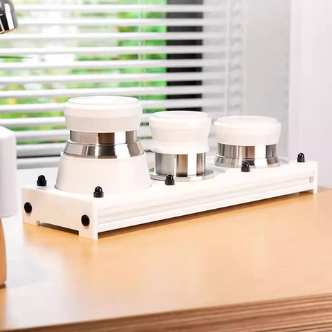 Top Shelf Hella Smooth 58Mm Stainless Steel Espresso Tamper Set With Spring Loaded Impact Hammer And Dual Needle Paddle Wdt Coffee Distributor For 58Mm Portafilter White on wood surface.