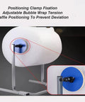 Close-up of the Positioning Clamp on No Sweat Compact Tabletop Bubble Wrap Dispenser securing bubble wrap rolls.