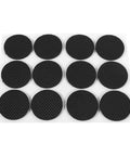 12 Pack Black Rubber Floor Pads With Adhesive Round Furniture Protectors on white sheet, non-slip and scratch-resistant