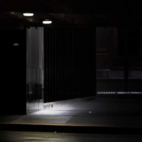 80W LED Canopy Light Outdoor Delivers 9600 Lumens Of Daylight 5000K Brightness For Garages And Canopies Replaces 300 To 600W MH HPS HID Equiv IP65 Waterproof 120V CETLus Listed Low Glare With Overvoltage And Overtemperature Protection illuminating a dark outdoor walkway