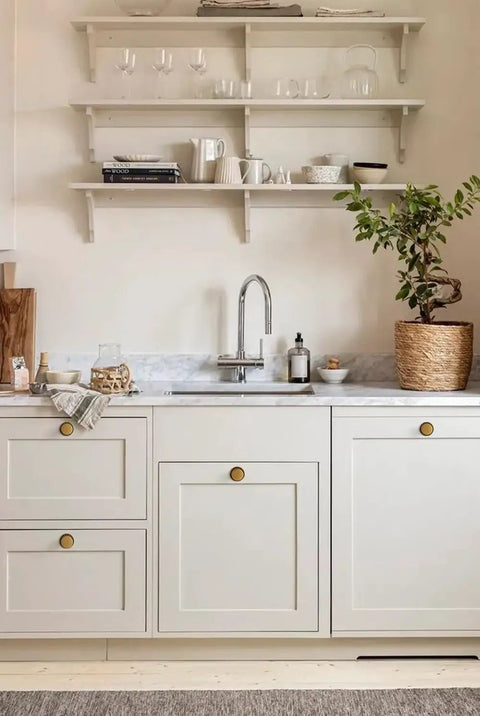 Antique Brass Cabinet Knobs With Backplate Beaded Round Hardware 6 Pack for kitchen drawers in farmhouse-style kitchen setting.