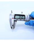 Measuring tool gauging a miniature ball bearing from the Miniature Ball Bearing Kit Ten Pack MR128ZZ ABEC Five Chrome Steel 8x12x3.5mm High Precision Bearings for DIY Projects