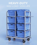 Front view of a metal rolling storage cart with eight blue bins and locking caster wheels.