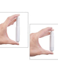 Two Pack Universal Toilet Paper Holder Replacement Rod Set, Spring Loaded, Retractable Plastic Rods shown in hand size comparison