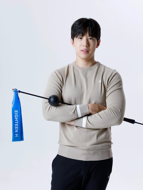 Fast Swing Golf Trainer For Speed And Path Improvement Distance Boost With Lightweight Stick And Latex Band held by a man