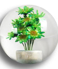 Cool 54mm Crystal Flower Shift Knob Real Flower Resin Ball for Manual and Automatic Transmissions Universal Fit Gated Style Only Fits 5 and 6 Speed Shifters Includes 3 Adapters for Most Cars Trucks Green showing embedded green floral design.