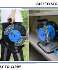 Heavy Duty Extension Cord Reel With 4 Grounded Outlets Open Cord Roller being carried and stored, black and blue design