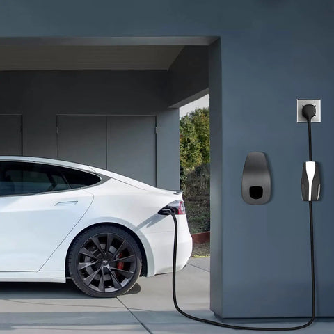 Slick Wall Mount Charging Cable Organizer For Tesla With Beefy Chassis Bracket And Tight Grip Power Cord Holder For Model 3 Model Y Model S Model X Garage Setup Matte Black mounted on wall next to charging Tesla.