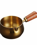 Stainless Steel Espresso Measuring Cup 6 Oz 180 Ml With Wooden Handle And V Shaped Spout For Brewing Espresso Measuring Sauces Reheating Soup And Heating Milk Gold Finish Durable 304 Grade Kitchen Tool, featuring a gold finish and wooden handle