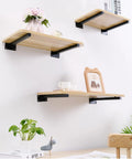 Hella Sturdy Black Industrial Floating Shelf Brackets Set Of Two Heavy Duty Wall Mount supports showcasing stylish wooden shelves.