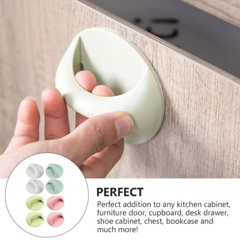Hand applying 8 Pack Self Adhesive Wardrobe Handles For Cabinets And Drawers No Drill Punch Free Easy Stick On Door Knobs with colorful surface