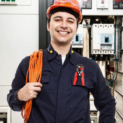 Electrician holding Automatic Self Adjusting 3 In 1 Wire Stripper Tool With Crimper And Wire Cutters in electrical room