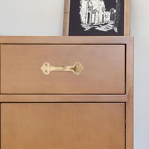 Brass Cabinet Handle 125mm Center To Center Matte Finish Modern Door Pulls for wardrobe drawers on a wooden cabinet.