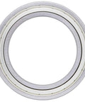 Close-up of a single deep groove radial ball bearing with double metal shield, part of a Five Pack Deep Groove Radial Ball Bearings 55 Mm Inner Diameter 80 Mm Outer Diameter 13 Mm Width With Double Metal Shield Built For Heavy Duty Use And Smooth Spin For Tools Machinery DIY Projects And Hobbies.