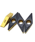 Heavy Duty Carbide Turning Indexable Inserts Vbmt160408 Pm4225 For Cnc Lathe Machine Metal Milling showing four pieces with gold and black design.