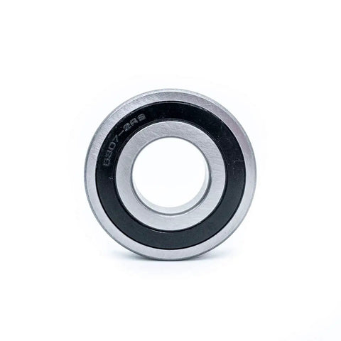 Heavy Duty Front Load Washer Tub Bearing And Seal Kit Designed To Crush Drum Grumbling Stop Leaks Early And Restore Snappy Spins For Frigidaire Kenmore Appliances In Your Everyday Laundry Room. Silver washer drum bearing with black seal.