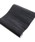 Removable Self Adhesive Wallpaper Roll For Waterproof Cabinet Makeover And Buttery Smooth Peel Stick Furniture Wrap With Authentic Wood Grain Look, showcasing a rolled black wood grain vinyl.