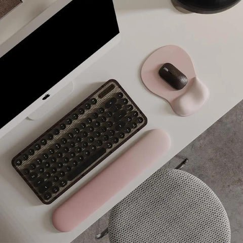 ErgoComfort Gel Wrist Rest Mouse Pad With Non Slip Base, Ergonomic Office Mousepad With Wrist Support, Comfortable Desk Mat For Home And Gaming, Enhanced Fatigue Relief, Pink Serenity 02 displayed on a white desk next to a keyboard and monitor.