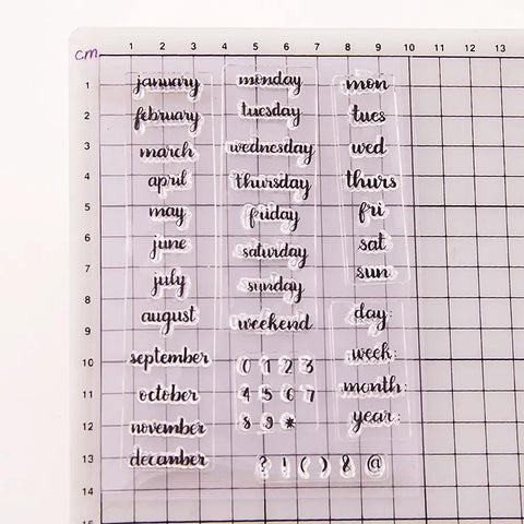 Straight Up Durable Calendar Clear Stamps With Solid Silicone Week Month Year Date Numbers layout on transparent sheet with grid