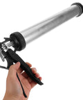 Top Tier Metal Caulk Gun With Thick Half Round Rod For Windows Doors And Bathroom Sealant Worry Free Application Adhesive Applicator in hand.