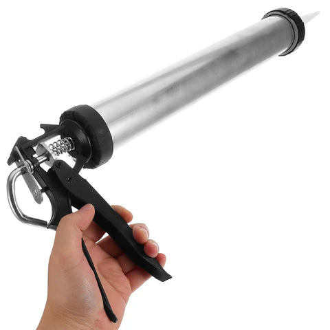 Top Tier Metal Caulk Gun With Thick Half Round Rod For Windows Doors And Bathroom Sealant Worry Free Application Adhesive Applicator in hand.