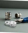 Twelve Piece 6mm Rope Guide Pulley Blocks For Outdoor Use With Swivel Cable Lifting Rollers, tools on gray surface