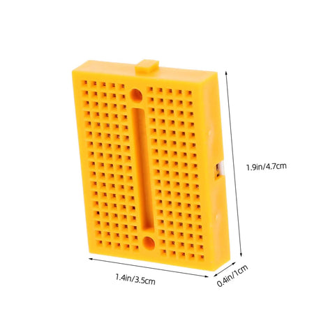 Compact yellow protoboard for rapid circuit assembly, measuring 1.9x1.4x0.4 inches, part of Plug And Play Solderless Breadboard Kit.